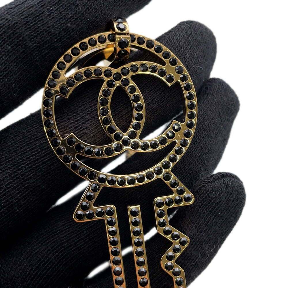 CHANEL Gold Logo Necklace - Picture 8 of 12
